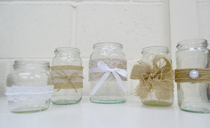 Collect your jam jars and decorate using ribbon, pearls, hessian etc. 
