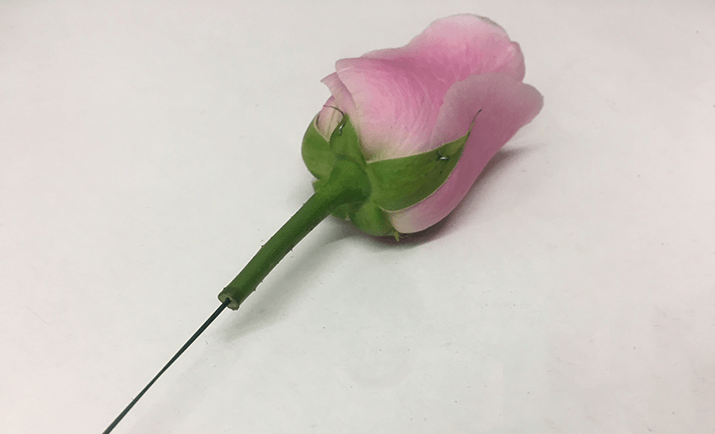 ... and here, we have the final result. You will now need to seal the rose with parafilm tape from underneath the head of the rose on the natural stem all the way down to where the wire finishes. 