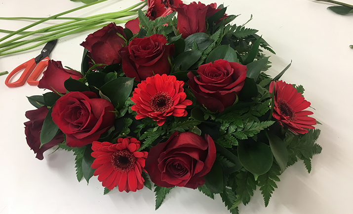 Add your additional flowers based on the style you have chosen. In this example, we have used Germini Suri...