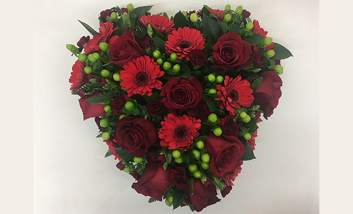 ... and here, we have the final result of our floral heart arrangement!